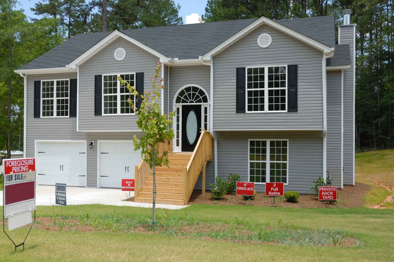 a nice house with grassy lawn