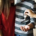 a couple receiving keys