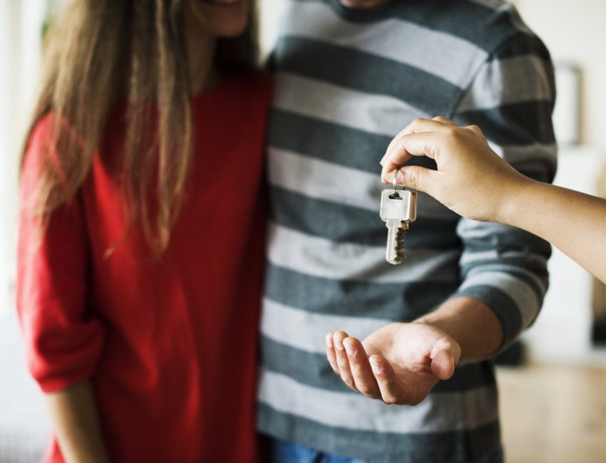 a couple receiving keys